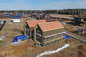 Строительство дуплекса 168 м² с отделкой планкеном и фальцем в КП Отрада-Виладж
