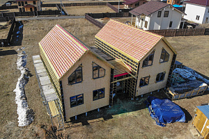 Строительство дуплекса 168 м² с отделкой планкеном и фальцем в КП Отрада-Виладж